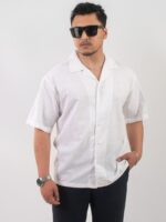 White summer shirt Nepal for men hanging on display - lightweight cotton casual wear