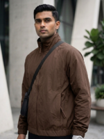 Premium brown zip-up windbreaker jacket with modern oversized fit and curved stitching available at Ranjana Complex Kathmandu Nepal.